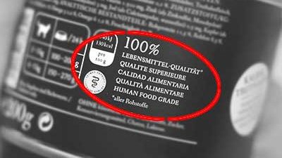 Aufdruck '100% Lebensmittel-Qualität' auf einer Tierfutterdose